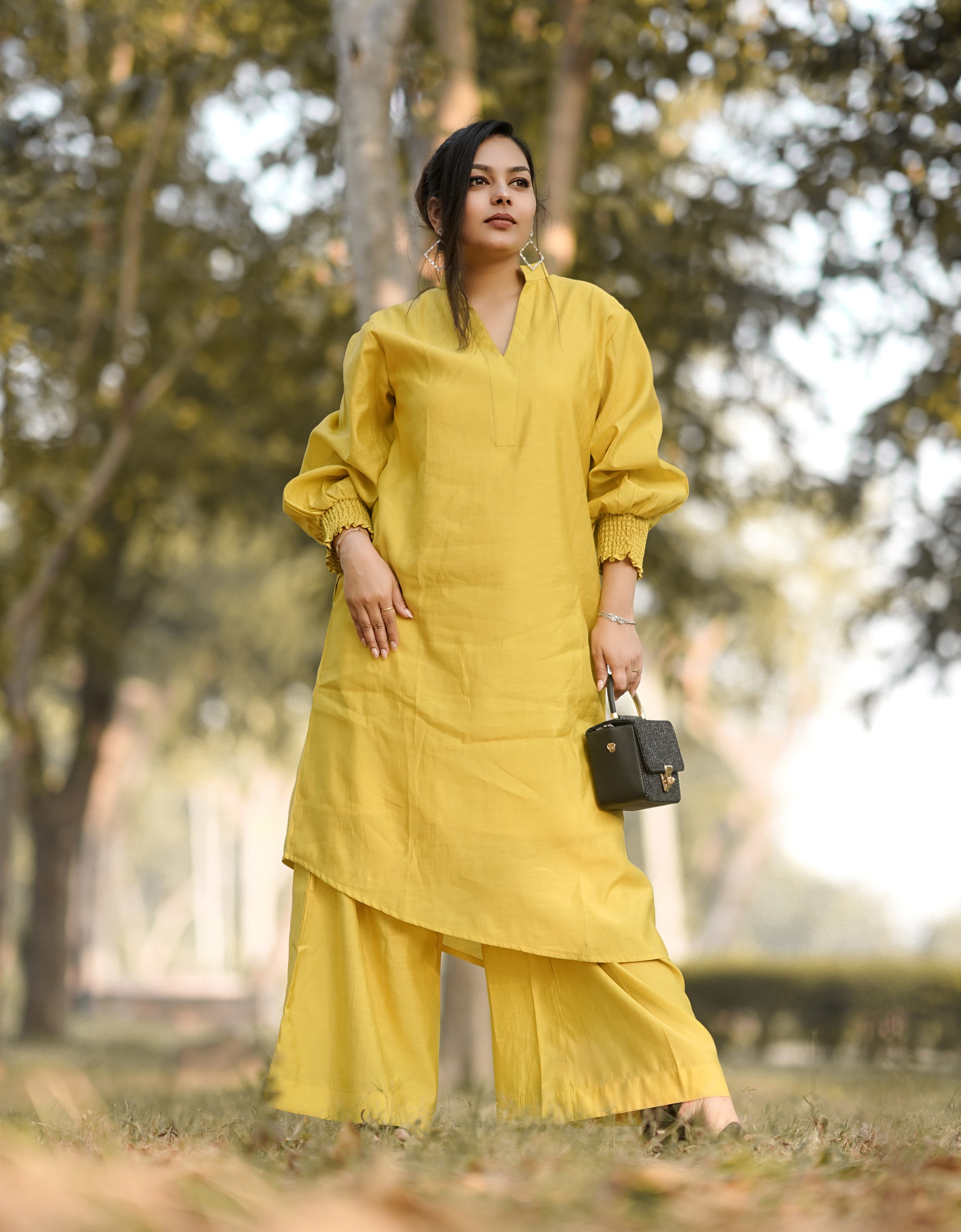 Solid Puffed Sleeve Women Kurta with Flared Palazzo Pants