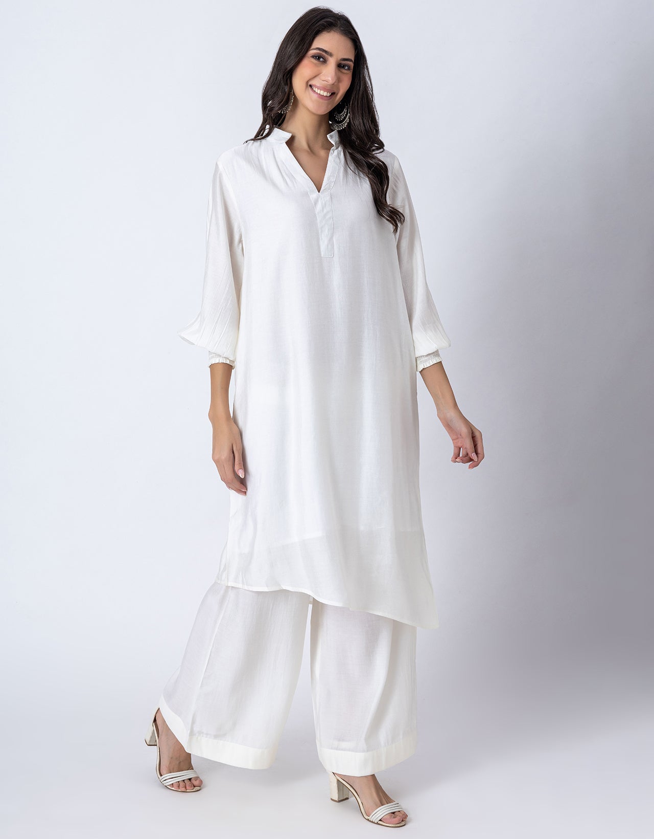 Solid Puffed Sleeve Women Kurta with Flared Palazzo Pants