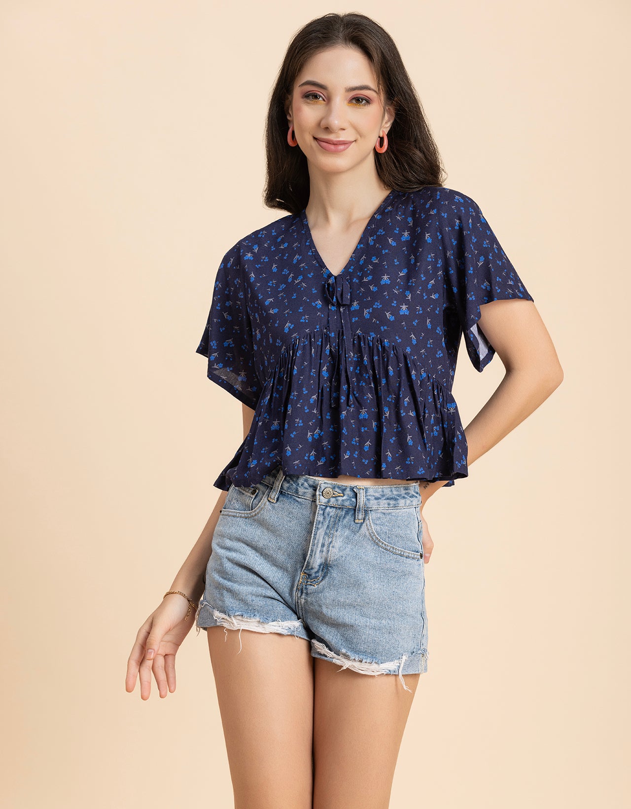 Printed V-Neck Peplum Top
